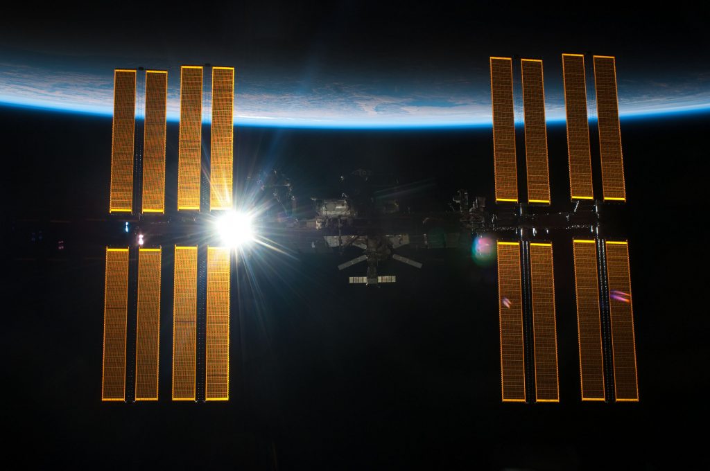 The International Space Station (ISS) in its orbit around Earth
