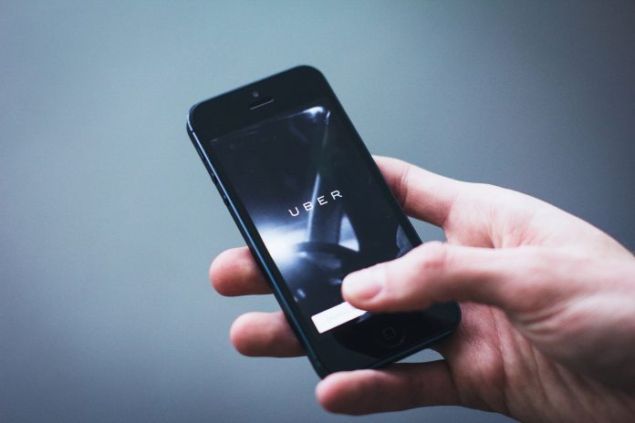 uber app opening on smartphone